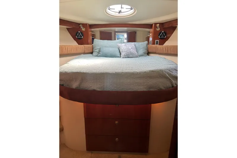 Slide: The Image of Luxurious bedroom interior of 2007 Meridian 411SB yacht with elegant bedding and wood accents. - 43