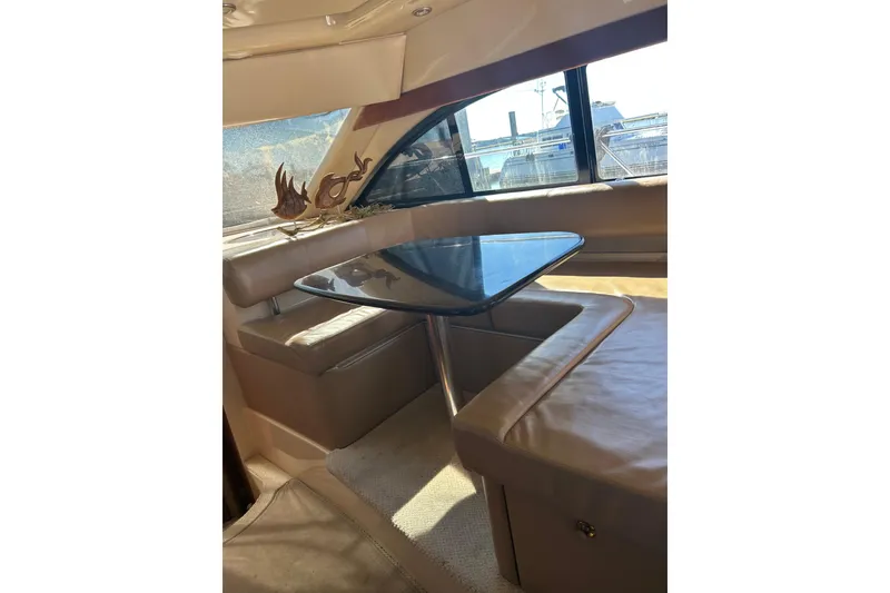 Slide: The Image of Interior of 2007 Meridian 411SB yacht with elegant seating and table. - 50