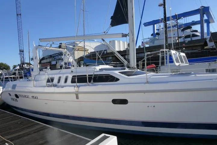 The Image of Hunter 450 Passage 1999 sailboat docked at marina, side view with clear sky. - 1