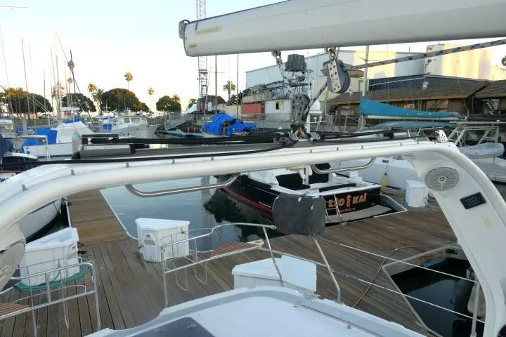 Slide: The Image of Hunter 450 Passage 1999 sailboat docked at marina with other boats. - 58