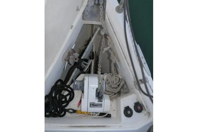 Slide: The Image of Anchor and ropes on 1999 Hunter 450 Passage sailboat deck. - 60