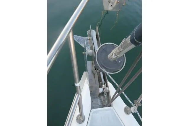 Slide: The Image of Bow of 1999 Hunter 450 Passage sailboat with anchor and rigging details. - 61