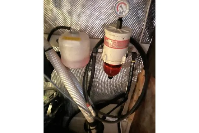 Slide: The Image of Fuel filter system in a 1999 Hunter 450 Passage yacht engine compartment. - 68