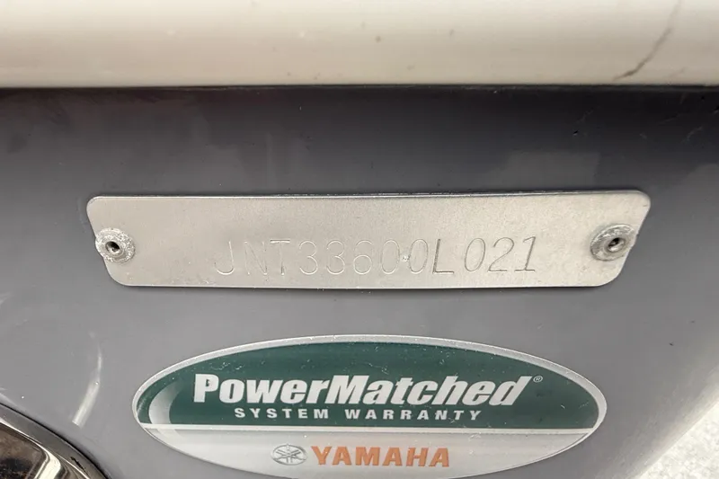 Slide: The Image of 2021 NauticStar 28 XS Offshore boat identification plate and Yamaha warranty sticker. - 26