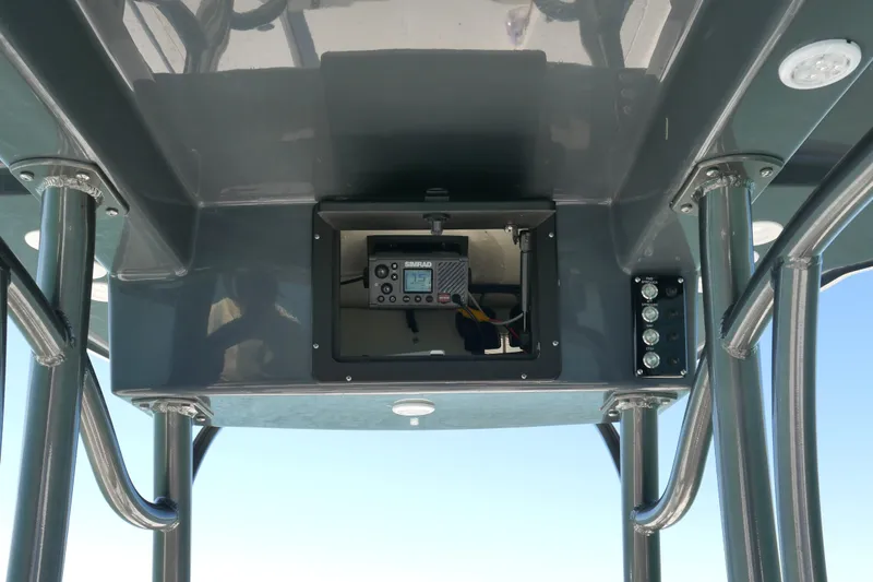 Slide: The Image of 2023 Sea Born FX24 Bay boat console with electronic controls and switches. - 17