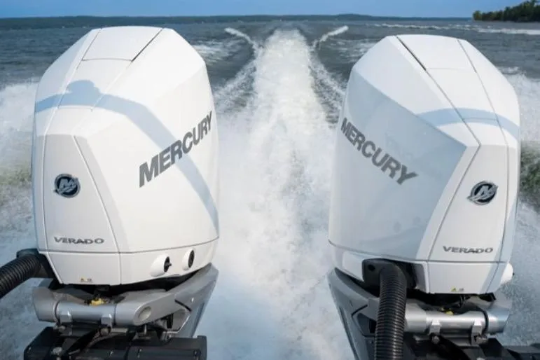 Slide: The Image of Twin Mercury Verado engines powering a 2026 Cruisers Yachts 38 VTR on open water. - 19
