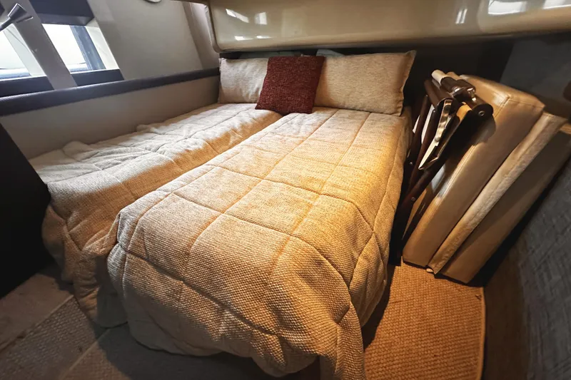 Slide: The Image of Luxurious bedroom interior of 2007 Azimut 43S yacht with cozy bedding. - 30