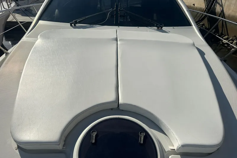 Slide: The Image of 2007 Azimut 43S yacht deck with white cushioned seating. - 36