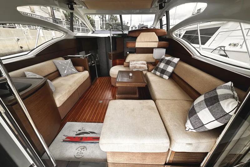 Slide: The Image of Luxurious interior of 2007 Azimut 43S yacht with elegant seating and wooden flooring. - 7