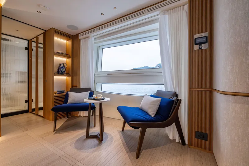 Slide: The Image of Luxurious interior of 2025 Benetti Oasis 34M yacht with ocean view and modern seating. - 33