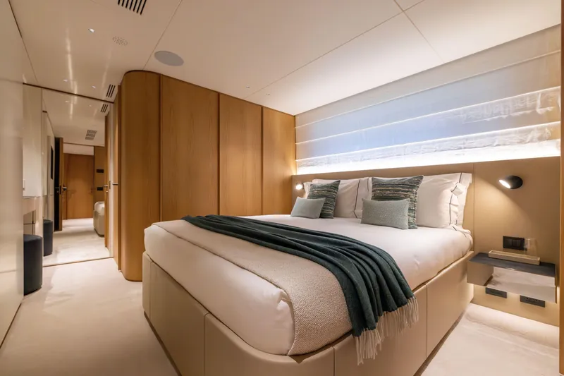 Slide: The Image of Luxurious bedroom interior on 2025 Benetti Oasis 34M yacht, featuring modern design and cozy ambiance. - 46