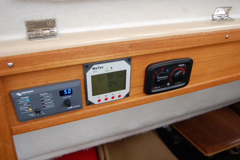 Slide: The Image of Control panel on 2018 Ranger Tugs R29 boat with digital displays and settings. - 14