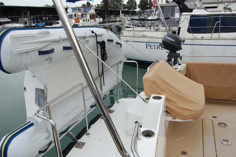 Slide: The Image of 2018 Ranger Tugs R29 boat with Yamaha motor and inflatable dinghy at marina. - 8