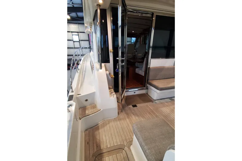 Slide: The Image of 2021 Sabre 45 Salon Express yacht interior with spacious seating and elegant design. - 25