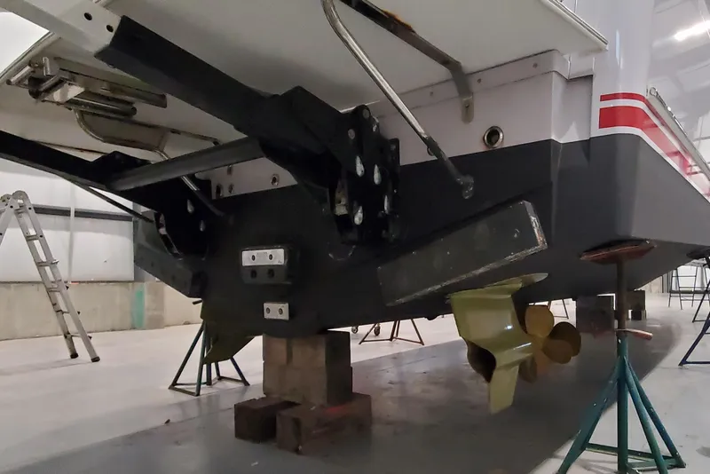 Slide: The Image of Engine room of 2021 Sabre 45 Salon Express with visible components and wiring. - 33