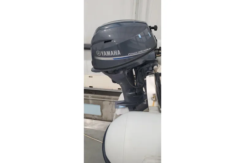 Slide: The Image of Yamaha four-stroke outboard motor on 2021 Sabre 45 Salon Express boat. - 42
