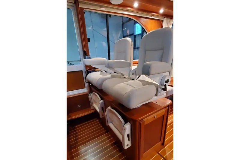 Slide: The Image of Interior helm of 2021 Sabre 45 Salon Express with Garmin navigation system. - 6