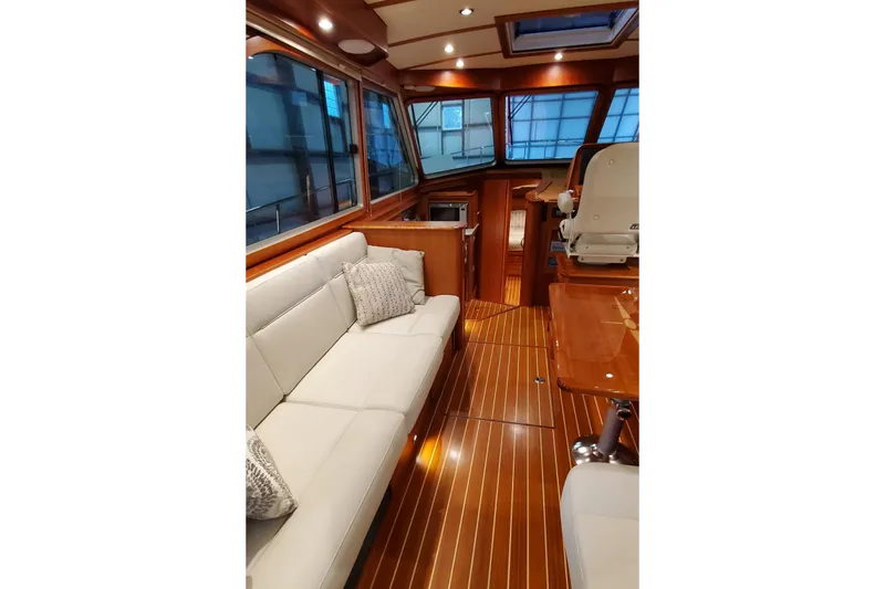 Slide: The Image of Luxurious interior of 2021 Sabre 45 Salon Express yacht with elegant seating and wooden finishes. - 9