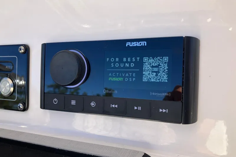 Slide: The Image of Fusion audio system on 2024 Sea Fox 248 Commander boat dashboard. - 13