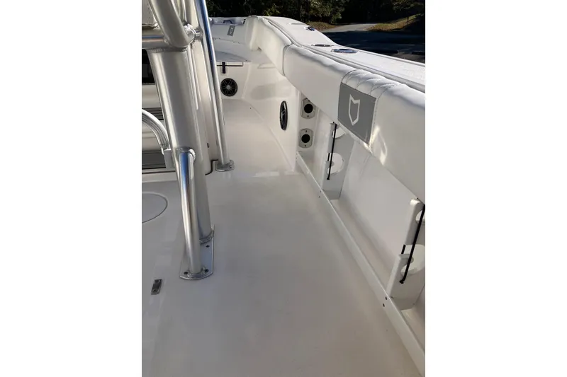 Slide: The Image of 2024 Sea Fox 248 Commander boat interior with sleek white design and stainless steel features. - 17