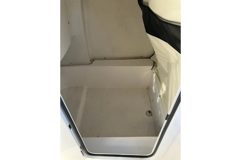 Slide: The Image of 2024 Sea Fox 248 Commander interior storage compartment, featuring a clean, spacious design. - 23