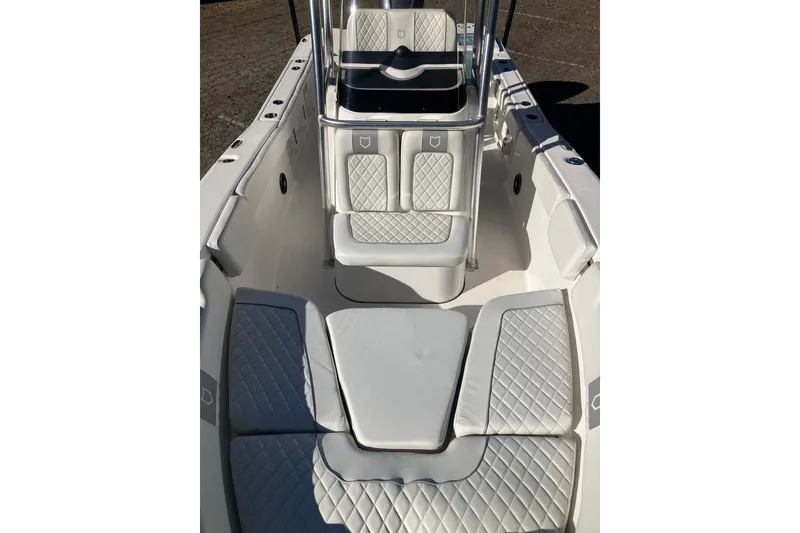 Slide: The Image of 2024 Sea Fox 248 Commander boat interior with cushioned seating and sleek design. - 28