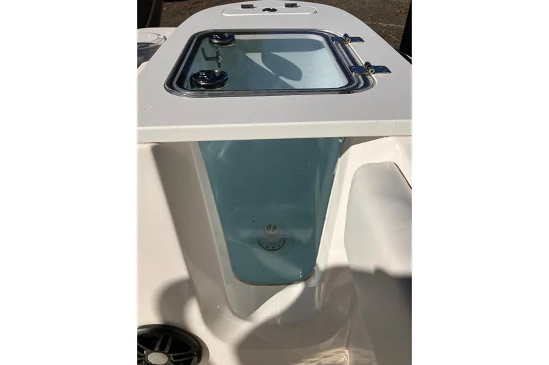 Slide: The Image of 2024 Sea Fox 248 Commander livewell with transparent lid and secure latches. - 35