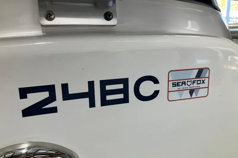 Slide: The Image of 2024 Sea Fox 248 Commander boat logo and branding detail. - 37