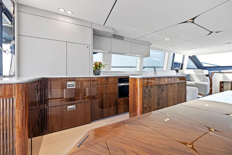 Slide: The Image of Luxurious interior of 2024 Fairline Squadron 68 yacht with modern kitchen design. - 23