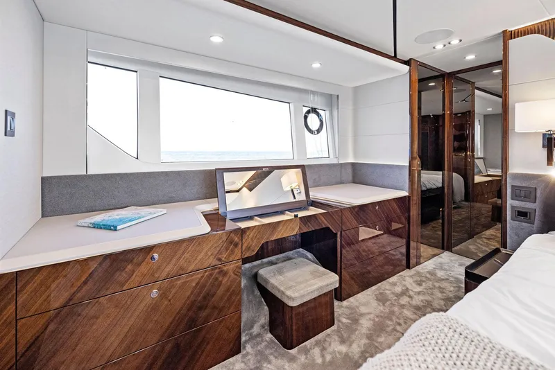 Slide: The Image of Luxurious interior of 2027 Fairline Squadron 68 yacht with elegant wood finish and modern design. - 42