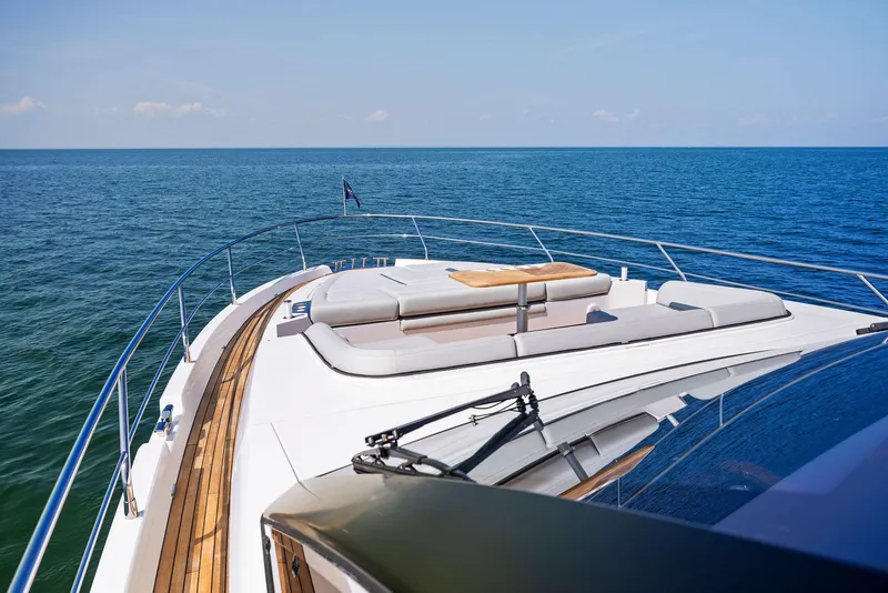 Slide: The Image of Fairline 2024 Squadron 68 yacht on open sea, featuring luxurious deck seating. - 8