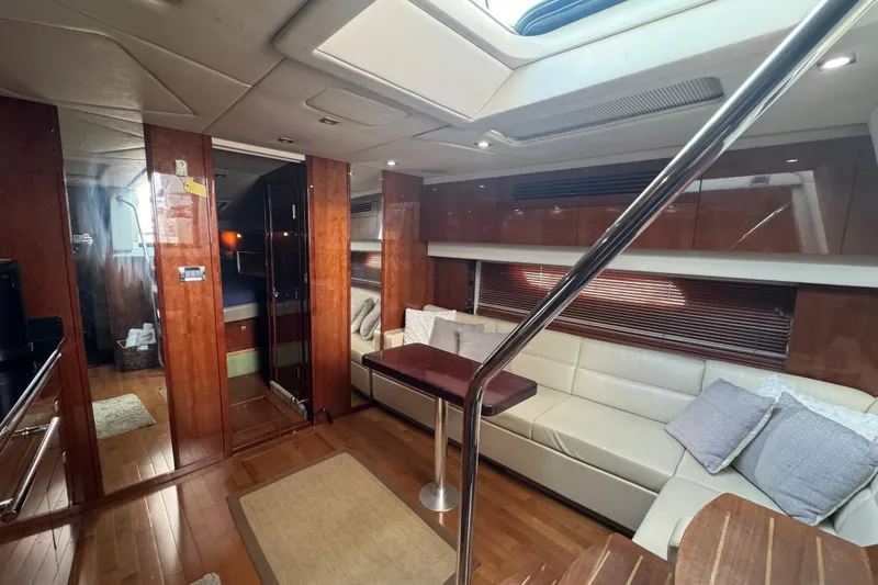 Slide: The Image of Luxurious interior of 2011 Sea Ray 470 Sundancer yacht with elegant wood finishes. - 33