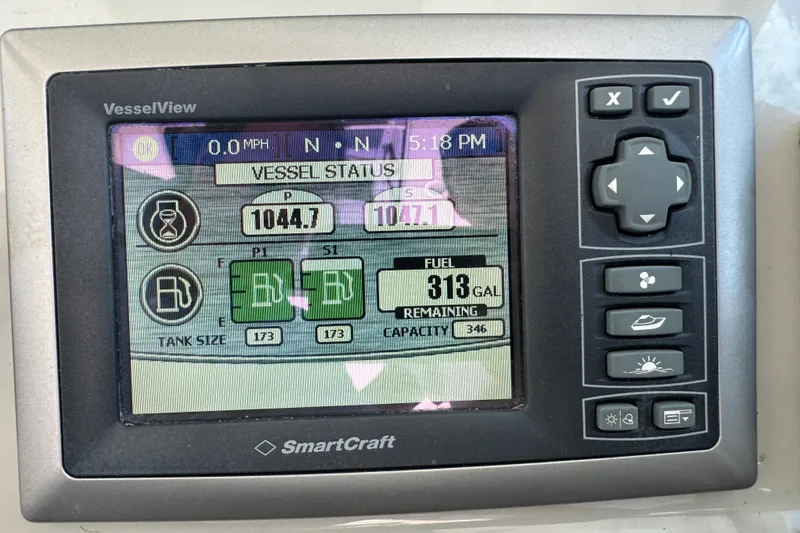 Slide: The Image of SmartCraft VesselView display on 2011 Sea Ray 470 Sundancer showing vessel status and fuel levels. - 43
