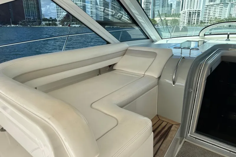 Slide: The Image of Luxurious interior of 2011 Sea Ray 470 Sundancer yacht with city skyline view. - 53