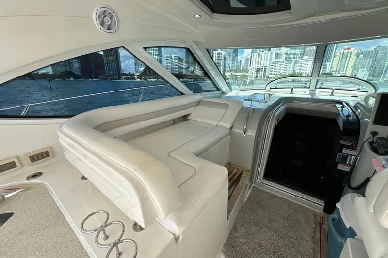 Slide: The Image of Luxurious interior of 2011 Sea Ray 470 Sundancer yacht with city skyline view. - 54