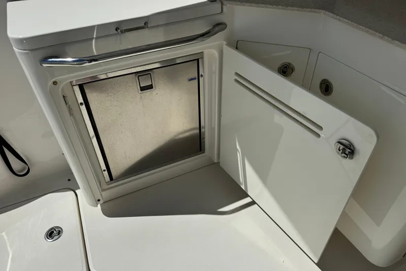 Slide: The Image of Open storage compartment on 2011 Sea Ray 470 Sundancer yacht. - 58