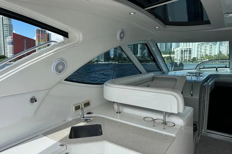 Slide: The Image of Luxurious interior of 2011 Sea Ray 470 Sundancer yacht with city skyline view. - 59