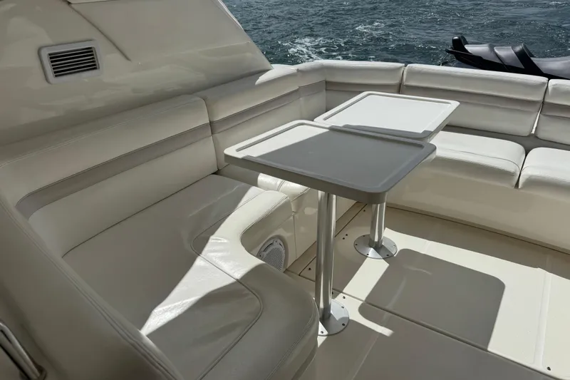 Slide: The Image of Luxurious seating area on 2011 Sea Ray 470 Sundancer yacht with ocean view. - 93