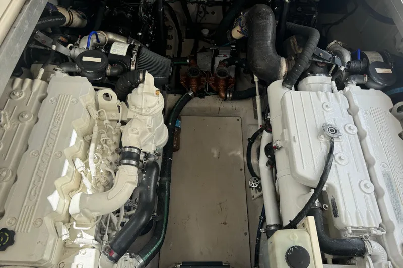 Slide: The Image of Engine room of a 2011 Sea Ray 470 Sundancer with Cummins engines. - 96