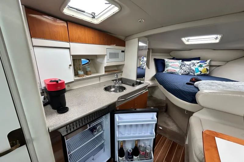 Slide: The Image of Looking forward past the galley to the cozy sleeping berth. - 16