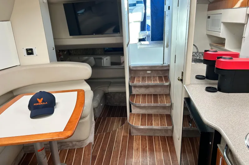 Slide: The Image of Looking aft towards the helm, with the head on the right past the galley. - 22