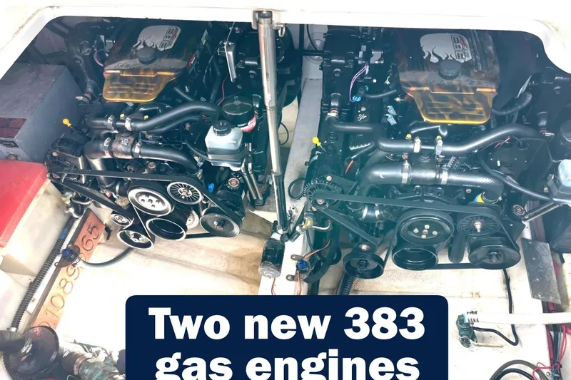 Slide: The Image of Engine compartment of a 2000 Formula 31 Performance Cruiser with two new 383 gas engines. - 32