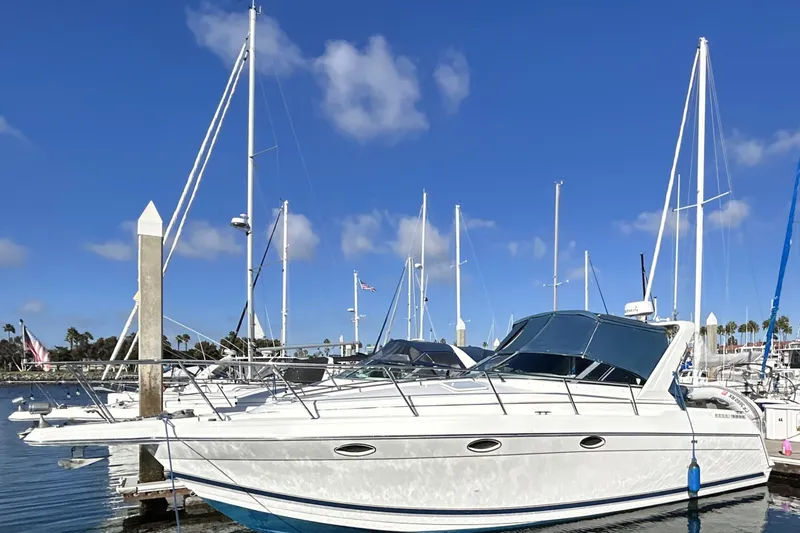 Slide: The Image of Docked at marina under clear blue sky. - 4