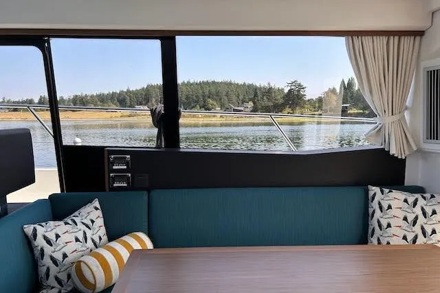 Slide: The Image of Interior of 2018 Jeanneau Velasco 37F yacht with scenic water view. - 10