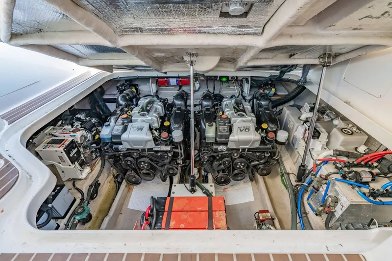 Slide: The Image of Engine room of 2016 Sea Ray 370 Express Cruiser with dual V8 engines. - 59