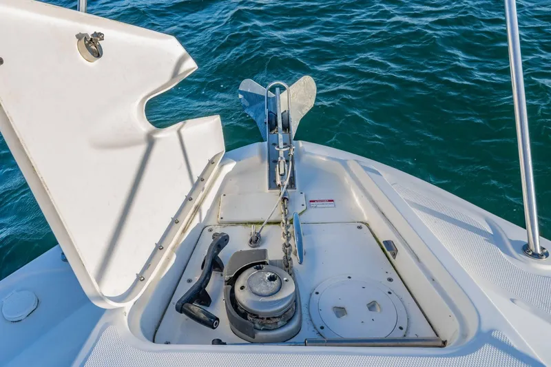 Slide: The Image of Anchor compartment of 2016 Sea Ray 370 Express Cruiser on open water. - 33