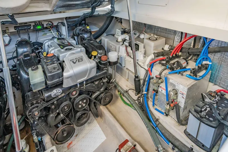 Slide: The Image of Engine room of 2016 Sea Ray 370 Express Cruiser with V6 engine and wiring. - 60