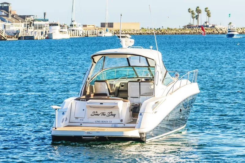 Slide: The Image of 2016 Sea Ray 370 Express Cruiser on blue water near Long Beach, California. - 7