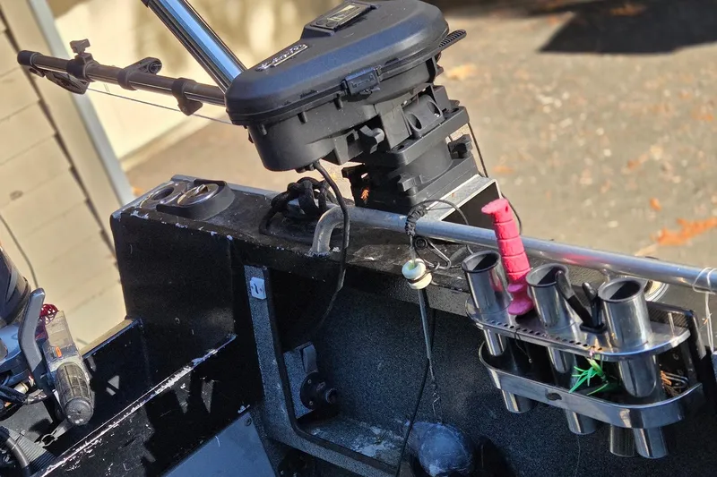 Slide: The Image of 2008 Alumaweld 22 Intruder boat with fishing rod holders and equipment. - 14