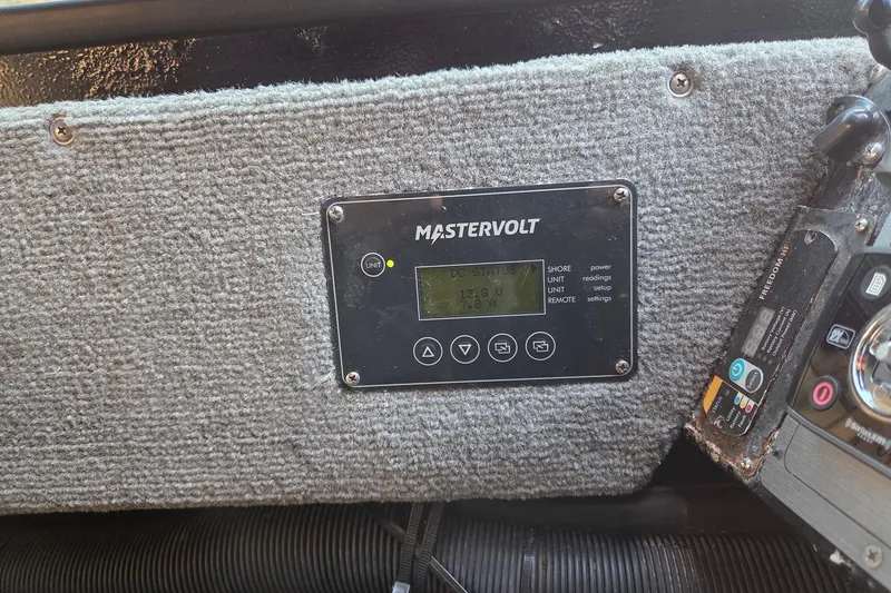 Slide: The Image of Mastervolt control panel on 2008 Alumaweld 22 Intruder boat dashboard. - 20